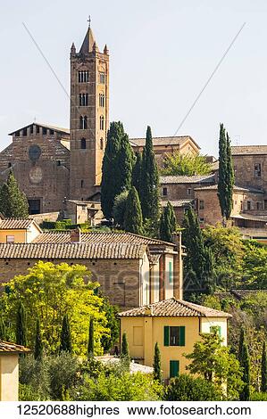 Stone buildings and church on landscape covered with trees; Siena, Tuscany, Italy View Large Photo Image Stock Photograph - Stone buildings and church on landscape covered with trees; Siena, Tuscany, Italy. Fotosearch