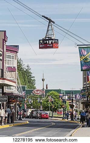 Store fronts along South Franklin Street with the tramway in the background, downtown Juneau, Southeast Alaska View Large Photo Image Stock Photography - Store fronts along South Franklin Street with the tramway in the background, downtown Juneau, Southeast Alaska. Fotosearch