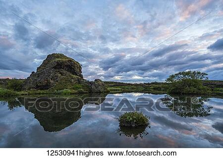 Sunset over the old lava and small pond near Lake Myvatn, North Iceland; Iceland View Large Photo Image Stock Photograph - Sunset over the old lava and small pond near Lake Myvatn, North Iceland; Iceland. Fotosearch