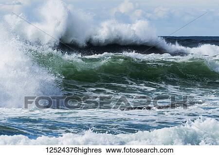 Surf breaks in the clouds; Newport, Oregon, United States of America View Large Photo Image Stock Photograph - Surf breaks in the clouds; Newport, Oregon, United States of America. Fotosearch