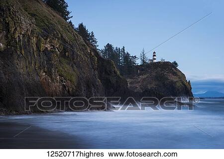 Surf washes the shore at dusk on the Washington Coast; Ilwaco, Washington, United States of America View Large Photo Image Stock Photograph - Surf washes the shore at dusk on the Washington Coast; Ilwaco, Washington, United States of America. Fotosearch