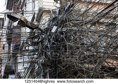 Stock Photograph - Tangled electrical wires; Kathmandu, Nepal. Fotosearch