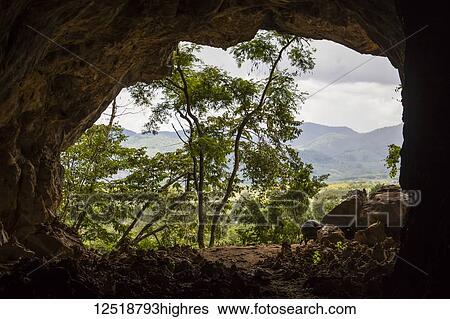 Stock Photograph - Tham Piu Cave, place where on 24 November 1969, a single rocket fired from a US aircraft killed an estimated 374 people who had taken refuge in the cave; Xiangkhouang, Laos. Fotosearch