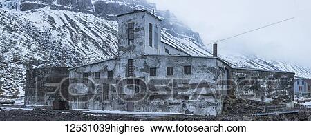 Stock Photograph - The abandoned herring factory in stormy weather; Djupavik, West Fjords, Iceland. Fotosearch
