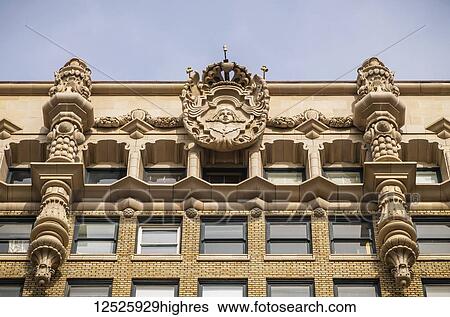 Stock Photograph - The facade at the top of the Million Dollar Theatre building; Los Angeles, California, United States of America. Fotosearch