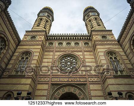 The Great Synagogue in Dohany Street, the largest Synagogue in Europe and the second largest in the world, built between 1854 and 1959 in Moorish Revival style; Budapest, Budapest, Hungary View Large Photo Image Stock Photograph - The Great Synagogue in Dohany Street, the largest Synagogue in Europe and the second largest in the world, built between 1854 and 1959 in Moorish Revival style; Budapest, Budapest, Hungary. Fotosearch