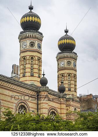 The Great Synagogue in Dohany Street, the largest Synagogue in Europe and the second largest in the world, built between 1854 and 1959 in Moorish Revival style; Budapest, Budapest, Hungary View Large Photo Image Stock Photograph - The Great Synagogue in Dohany Street, the largest Synagogue in Europe and the second largest in the world, built between 1854 and 1959 in Moorish Revival style; Budapest, Budapest, Hungary. Fotosearch