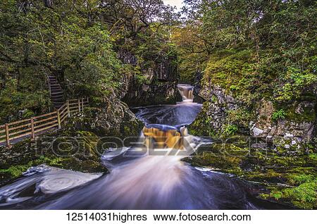 Stock Photograph - The Ingleton Waterfalls Trail, 5 miles long, with a vertical rise of over 500 feet; Ingleton, North Yorkshire, England. Fotosearch