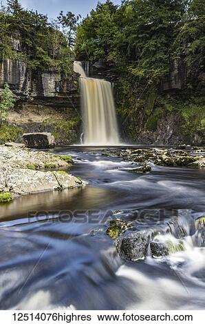 Stock Photograph - The most famous and spectacular of the waterfalls on the Ingleton Waterfalls Trail; Ingleton, North Yorkshire, England. Fotosearch