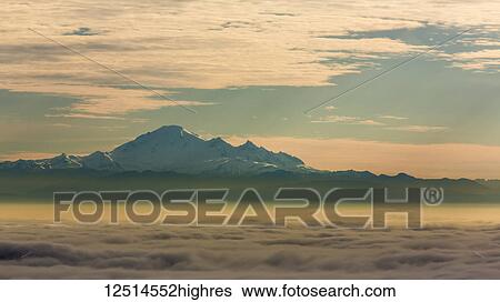 The peak of Mount Baker viewed from above the clouds; Vancouver, British Columbia, Canada View Large Photo Image Stock Photograph - The peak of Mount Baker viewed from above the clouds; Vancouver, British Columbia, Canada. Fotosearch