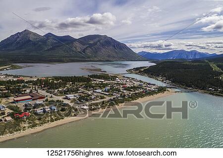The town of Carcross sits on Bennett Lake with Nares Mountain in the distance; Carcross, Yukon Territory, Canada View Large Photo Image Stock Photograph - The town of Carcross sits on Bennett Lake with Nares Mountain in the distance; Carcross, Yukon Territory, Canada. Fotosearch