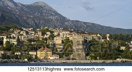 Stock Photograph - The town of Herceg Novi, Monte, viewed from the Bay of Kotor; Herceg Novi, Monte. Fotosearch