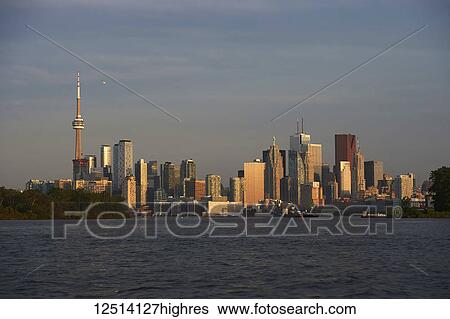 Stock Photograph - Toronto skyline and Lake Ontario in the early morning; Toronto, Ontario, Canada. Fotosearch