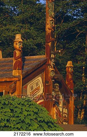 Totem Bight State Park Clan House And Totem Poles At Sunset At Ketchikan In Southeast Alaska View Large Photo Image Stock Photograph - Totem Bight State Park Clan House And Totem Poles At Sunset At Ketchikan In Southeast Alaska. Fotosearch