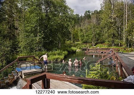 Tourists in the pools of Liard River Hot Springs, British Columbia, Canada View Large Photo Image Stock Image - Tourists in the pools of Liard River Hot Springs, British Columbia, Canada. Fotosearch