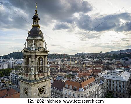 Stock Photograph - Tower of St. Stephen's Basilica and cityscape of Budapest; Budapest, Budapest, Hungary. Fotosearch
