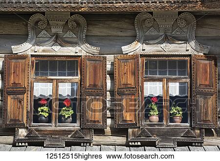 Traditional windows in a log house, built in 1882, Vitoslavlitsy Museum of Wooden Architecture; Veliky Novgorod, Novgorod Oblast, Russia View Large Photo Image Stock Photograph - Traditional windows in a log house, built in 1882, Vitoslavlitsy Museum of Wooden Architecture; Veliky Novgorod, Novgorod Oblast, Russia. Fotosearch