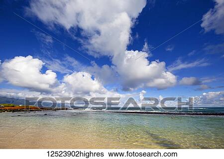 Tranquil water inside the reef at Baby Beach, North shore of Maui; Paia, Maui, Hawaii, United States of America View Large Photo Image Stock Photograph - Tranquil water inside the reef at Baby Beach, North shore of Maui; Paia, Maui, Hawaii, United States of America. Fotosearch