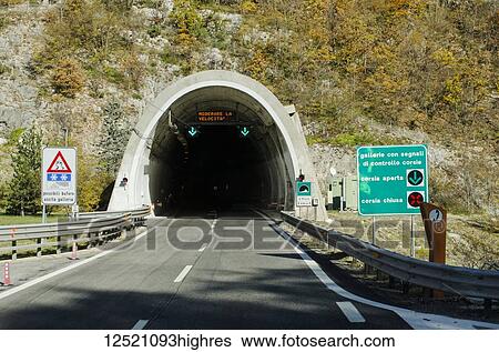 Tunnel for one-way traffic for a road, San Rocco, A 24 Rome to Teramo motorway; Abruzzi, Italy View Large Photo Image Stock Photograph - Tunnel for one-way traffic for a road, San Rocco, A 24 Rome to Teramo motorway; Abruzzi, Italy. Fotosearch