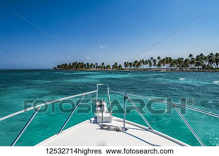 Vibrant turquoise ocean and the bow of a boat; Belize View Large Photo Image Stock Photograph - Vibrant turquoise ocean and the bow of a boat; Belize. Fotosearch