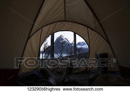 View from inside a tent through the door to the rugged peaks of the Kenai Mountains, Kachemak Bay State Park; Alaska, United States of America View Large Photo Image Stock Photograph - View from inside a tent through the door to the rugged peaks of the Kenai Mountains, Kachemak Bay State Park; Alaska, United States of America. Fotosearch