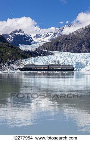Picture - View of a cruise ship at the face of Margerie Glacier, Glacier Bay National Park, Southeast Alaska, Summer.. Fotosearch