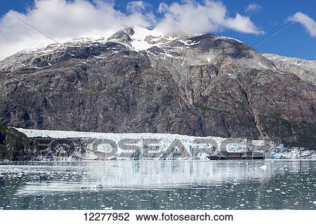 View of a cruise ship at the face of Margerie Glacier, Glacier Bay National Park, Southeast Alaska, Summer. View Large Photo Image Stock Image - View of a cruise ship at the face of Margerie Glacier, Glacier Bay National Park, Southeast Alaska, Summer.. Fotosearch