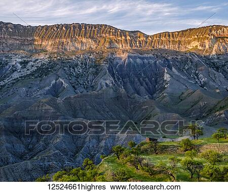 View of a small house on a ridge and the rugged landscape near the village of Salta; Republic of Dagestan, Russia View Large Photo Image Stock Photograph - View of a small house on a ridge and the rugged landscape near the village of Salta; Republic of Dagestan, Russia. Fotosearch