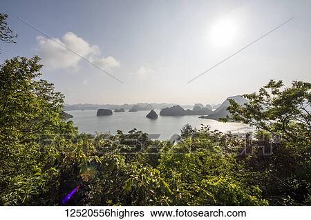 Stock Photograph - View of the limestone karsts and isles of Ha Long Bay, as seen from Titov Island; Quang Ninh, Vietnam. Fotosearch