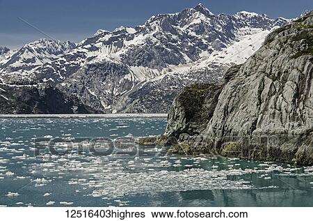 Stock Photograph - View West across mid Glacier Bay from tour boat Baranof Wind, Glacier Bay National Park and Preserve; Alaska, United States of America. Fotosearch