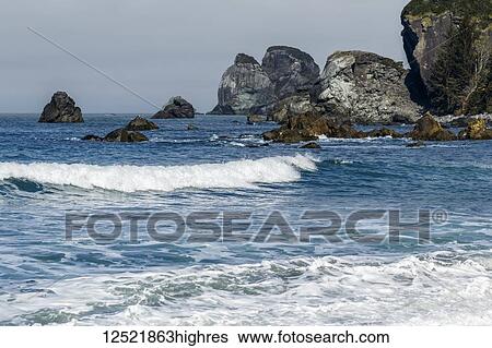 Waves coming ashore along the rocky California coast; Crescent City, California, United States of America View Large Photo Image Stock Photograph - Waves coming ashore along the rocky California coast; Crescent City, California, United States of America. Fotosearch
