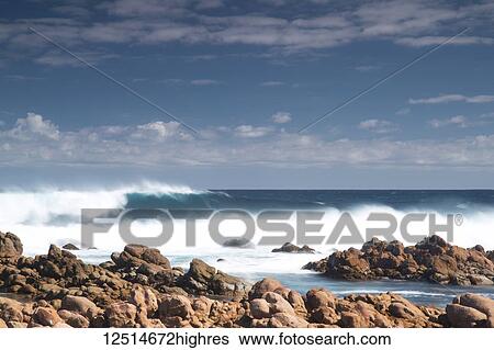Stock Photograph - Waves crashing as they break along the coast, Yallingup Beach; Yallingup, Western Australia, Australia. Fotosearch