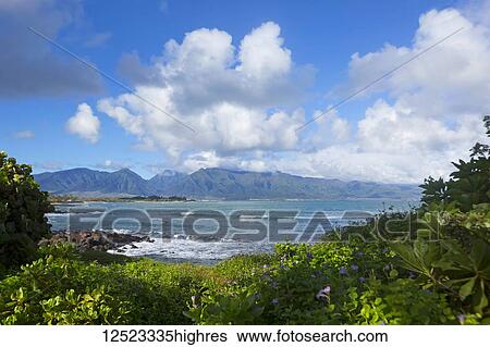 Stock Photograph - West Maui Mountains as viewed from the North shore of Maui; Paia, Maui, Hawaii, United States of America. Fotosearch