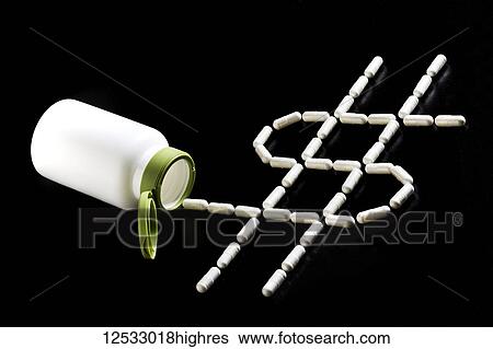 White pill container opened with tablet capsules in a symbolic dollar sign formation on black background View Large Photo Image Stock Photograph - White pill container opened with tablet capsules in a symbolic dollar sign formation on black background. Fotosearch