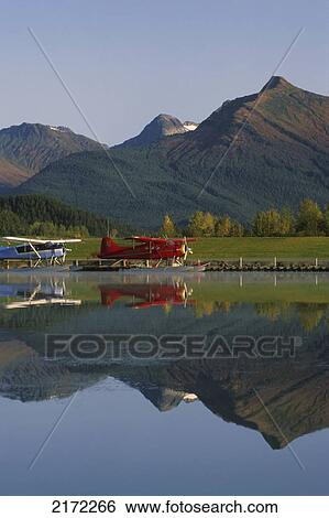 Stock Photograph - Wings Of Alaska Floatplanes Docked Juneau Southeast Ak Scenic. Fotosearch