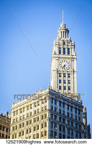 Stock Photograph - Wrigely Building clock tower; Chicago, Illinois, United States of America. Fotosearch