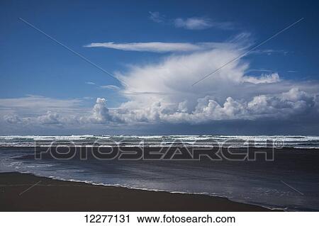 Stock Image - A rain shower passes near the beach; Seaside, Oregon, United States of America. Fotosearch