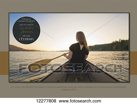 A young woman rowing in a boat at sunset with french scripture; Vancouver, British Columbia, Canada View Large Photo Image Stock Photo - A young woman rowing in a boat at sunset with french scripture; Vancouver, British Columbia, Canada. Fotosearch
