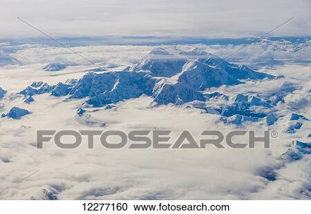 Aerial view of snowcovered Mt. McKinley's northwest buttress, Interior Alaska, Winter, USA View Large Photo Image Stock Image - Aerial view of snowcovered Mt. McKinley's northwest buttress, Interior Alaska, Winter, USA. Fotosearch