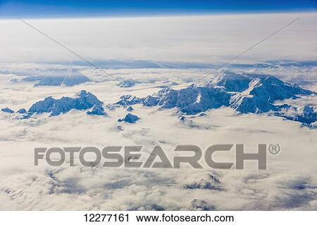 Aerial view of snowcovered Mt. McKinley's northwest buttress, Interior Alaska, Winter, USA View Large Photo Image Stock Image - Aerial view of snowcovered Mt. McKinley's northwest buttress, Interior Alaska, Winter, USA. Fotosearch