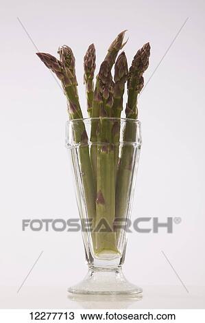 Asparagus (Asparagus officinalis) in a glass; Edmonton, Alberta, Canada View Large Photo Image Stock Image - Asparagus (Asparagus officinalis) in a glass; Edmonton, Alberta, Canada. Fotosearch