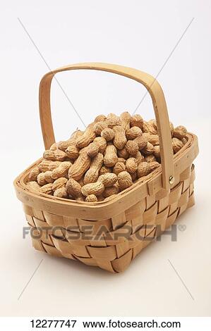 Stock Photo - Basket of peanuts; Edmonton, Alberta, Canada. Fotosearch