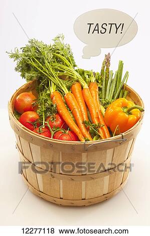 Basket of vegetables with text bubble saying tasty; Edmonton, Alberta, Canada View Large Photo Image Stock Photo - Basket of vegetables with text bubble saying tasty; Edmonton, Alberta, Canada. Fotosearch