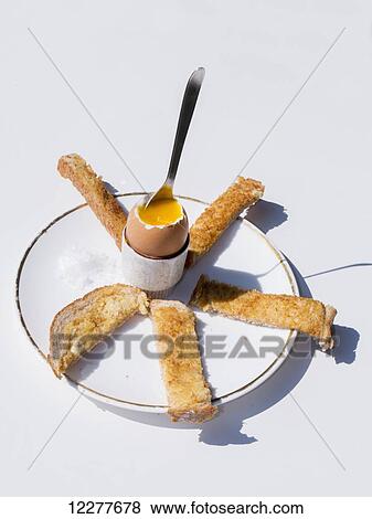Stock Photo - Boiled egg breakfast; England. Fotosearch