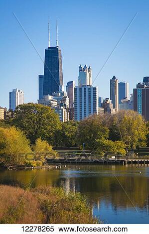 Stock Photography - Chicago skyline from Lincoln Park Zoo; Chicago, Illinois, United States of America. Fotosearch