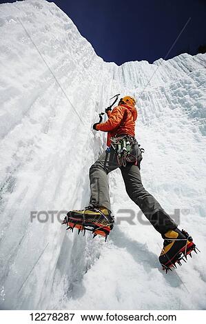 Climbing an ice wall; Saint-Donat, Quebec, Canada View Large Photo Image Stock Photo - Climbing an ice wall; Saint-Donat, Quebec, Canada. Fotosearch