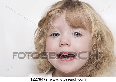 Close up of a toddler with beauty big eyes and blond hair; Spruce Grove, Alberta, Canada View Large Photo Image Stock Photo - Close up of a toddler with beauty big eyes and blond hair; Spruce Grove, Alberta, Canada. Fotosearch