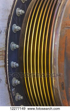 Close up of an electrical power plant coupling, bolts and threads, Prudhoe Bay, Arctic Alaska, USA, Summer View Large Photo Image Stock Photo - Close up of an electrical power plant coupling, bolts and threads, Prudhoe Bay, Arctic Alaska, USA, Summer. Fotosearch