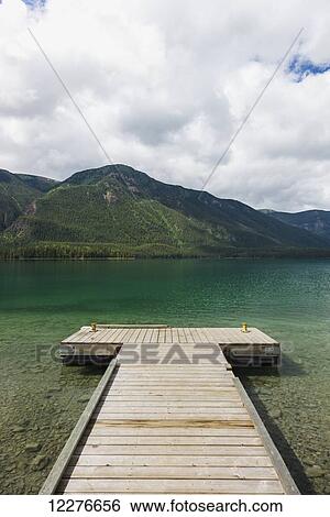 Stock Photograph - Dock at Muncho Lake Provincial Park, British Columbia, Canada, Summer. Fotosearch