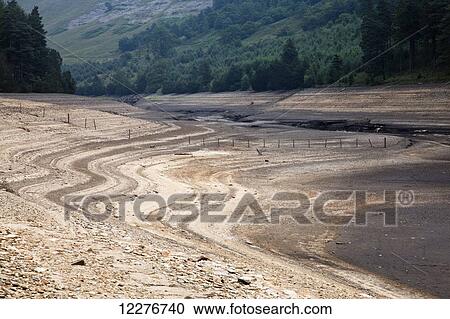Dry reservoir during drought; Derbyshire, England View Large Photo Image Stock Image - Dry reservoir during drought; Derbyshire, England. Fotosearch